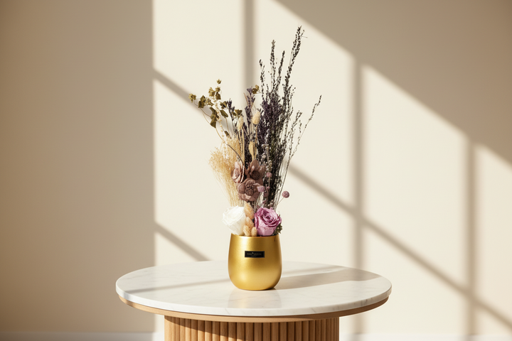 Preserved floral arrangement by Esor Atelier featuring vibrant, long-lasting blooms in a decorative display.