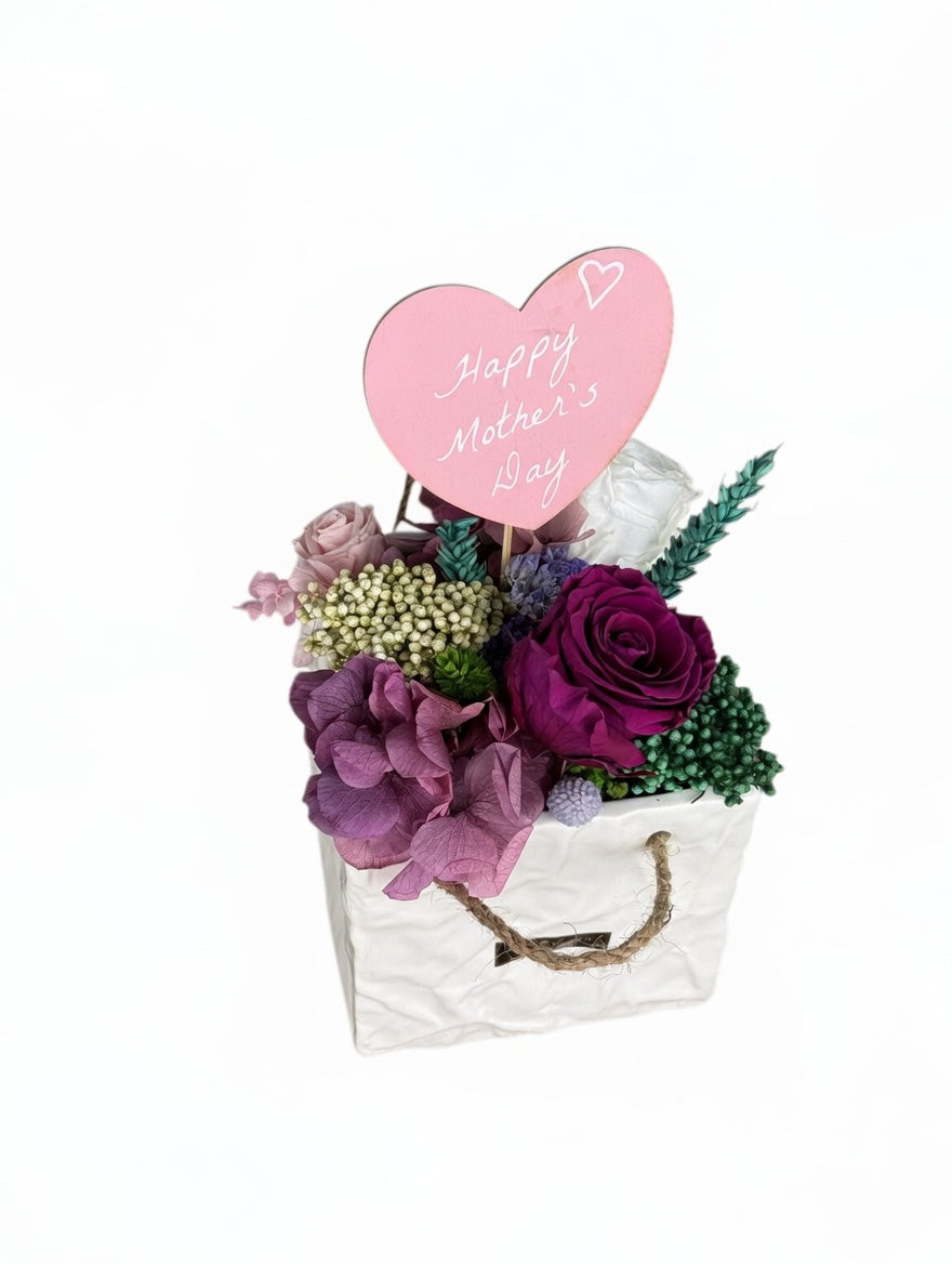 Esor Atelier Maya preserved floral arrangement with vibrant, lifelike dried flowers and greenery in a stylish display.