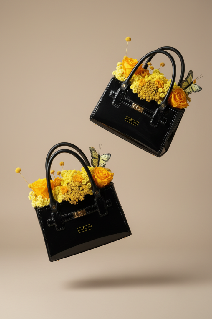 Preserved marigold flower from Esor Atelier, showcasing vibrant orange petals and detailed texture of the floral arrangement.