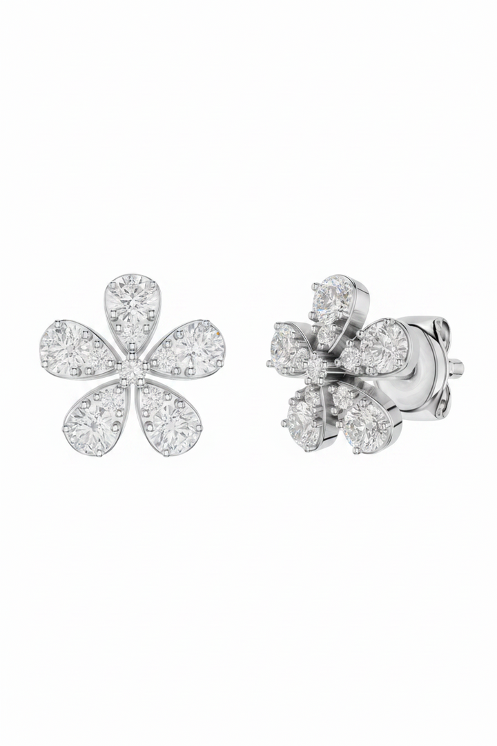 Esor Atelier Florenne earrings in polished white gold with 0.26ct diamond accents, showcasing elegant jewelry design.