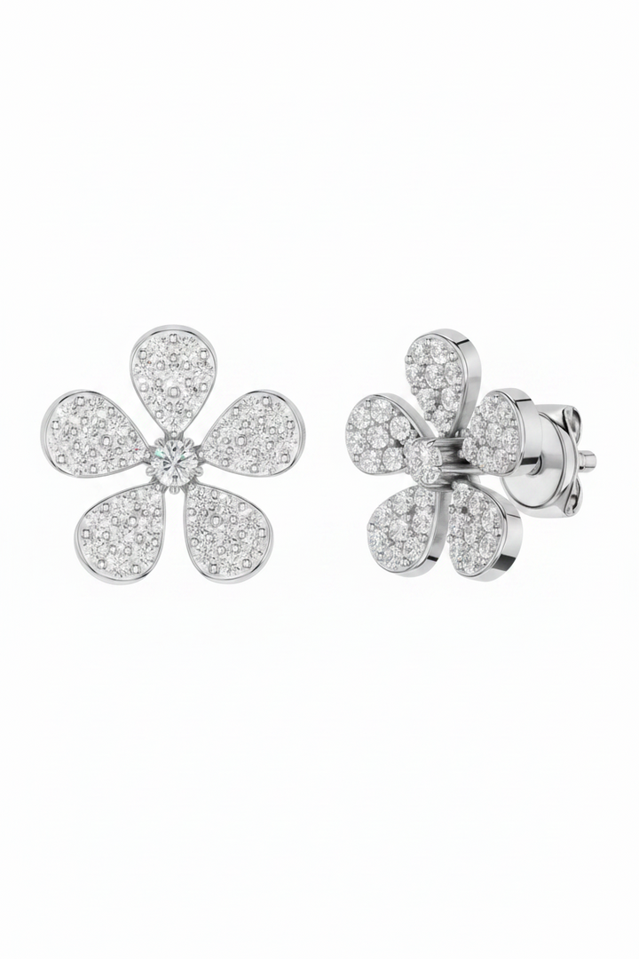 Eloria earrings by Esor Atelier featuring polished white gold and 0.26ct gemstones, shown in a close-up view.
