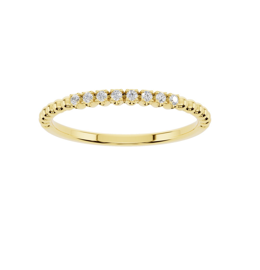 Polished yellow gold ring from Esor Atelier, showcasing a sleek, shiny finish with a smooth, elegant surface.