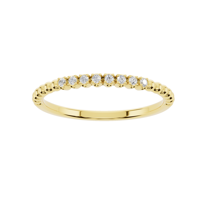 Polished yellow gold ring from Esor Atelier, showcasing a sleek, shiny finish with a smooth, elegant surface.