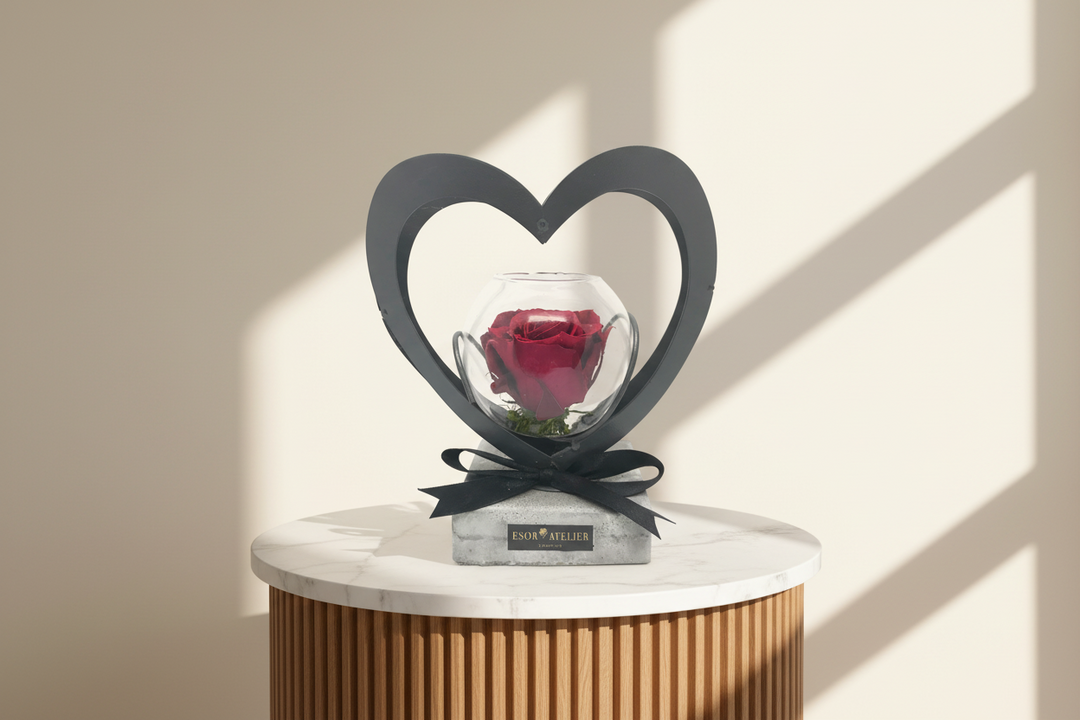 Eternal rose named Ava by ESOR ATELIER, showcasing a beautifully preserved red rose in a delicate glass display.