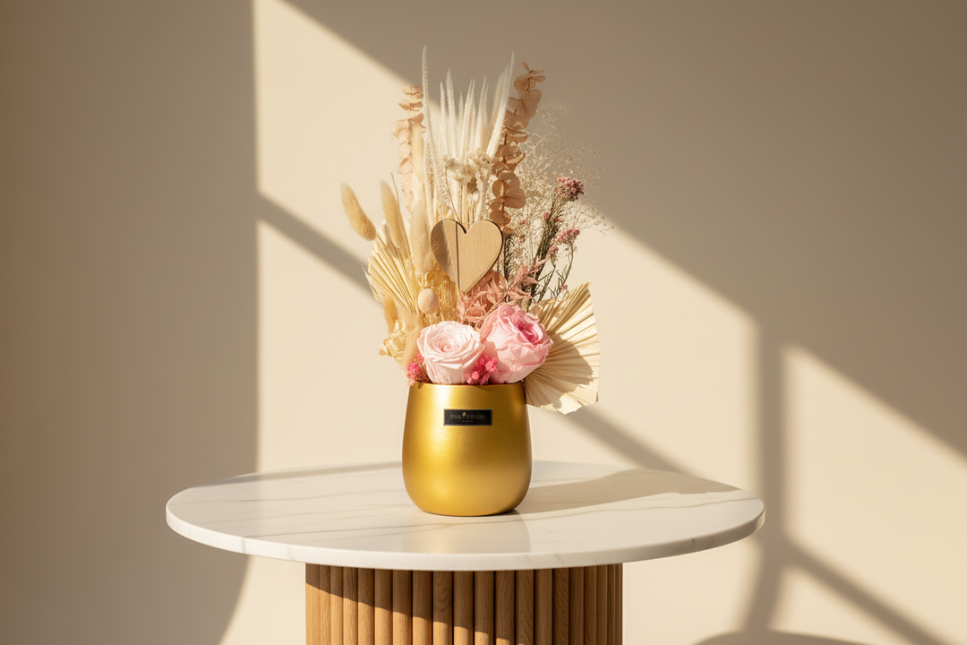 Esor Atelier Renata preserved floral arrangement with vibrant, lifelike blooms in a decorative display.