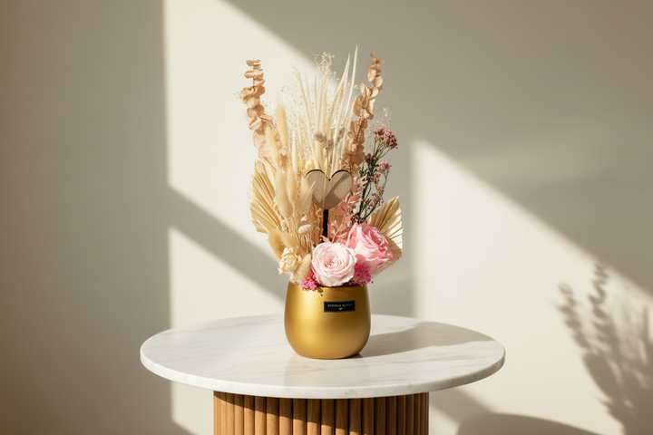 Preserved floral arrangement by Esor Atelier featuring vibrant, long-lasting blooms in a stylish display.