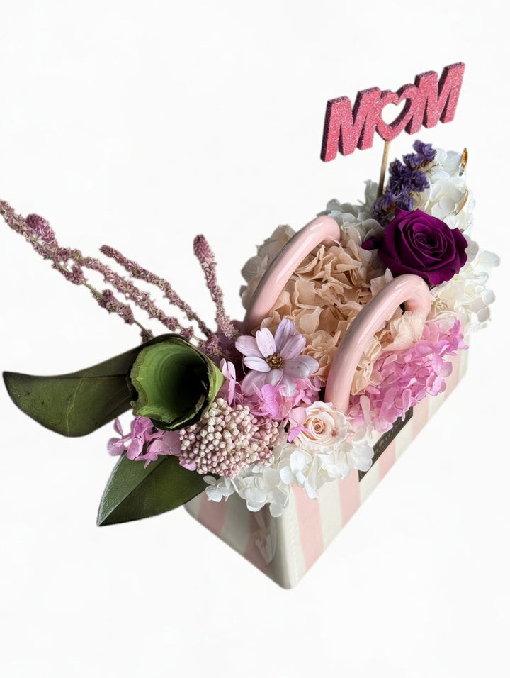 Beautiful preserved floral arrangement named Eleanor by Esor Atelier, featuring vibrant, long-lasting dried flowers and greenery.