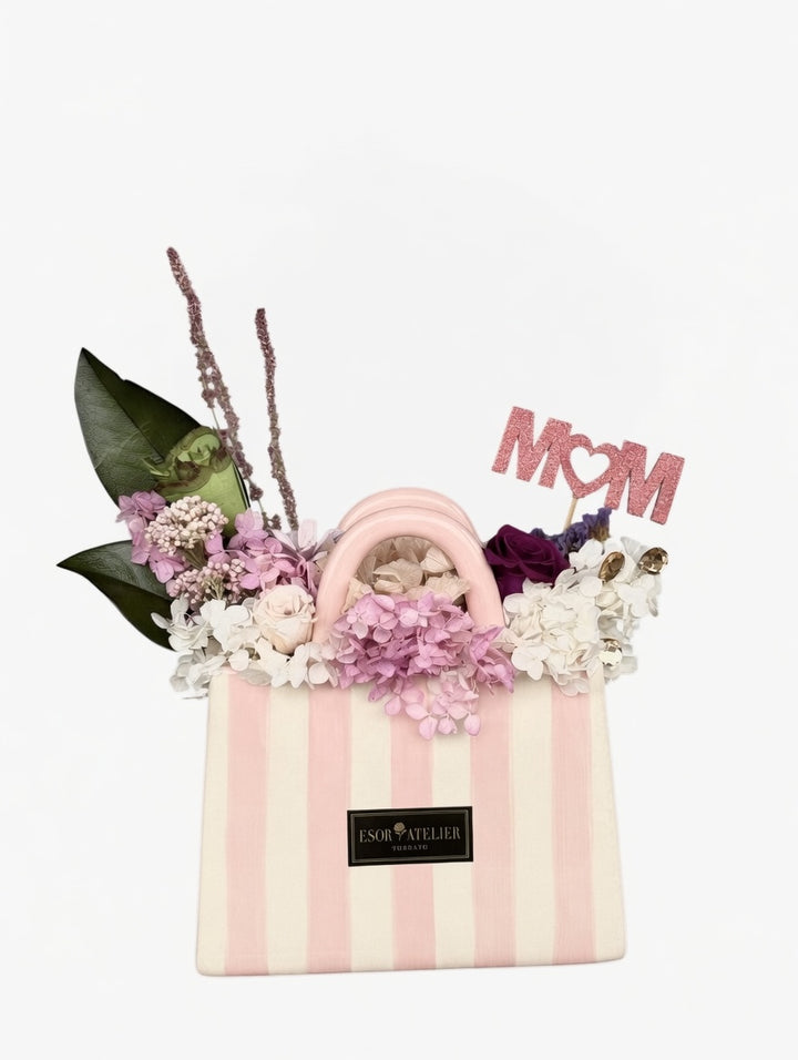 Preserved floral arrangement named Eleanor by Esor Atelier, featuring elegant, dried flowers in a stylish display.