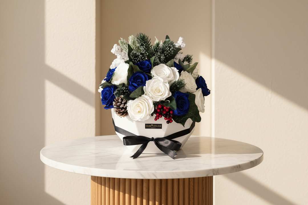 White eternal rose named Inés by Esor Atelier displayed on a neutral background, showcasing delicate petals and elegant design.