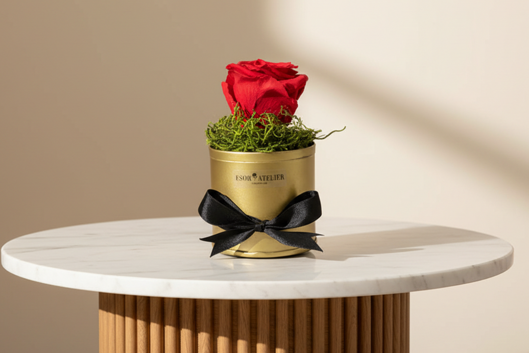 Eternal rose from ESOR ATELIER's One Love collection, beautifully preserved in a clear glass display case.