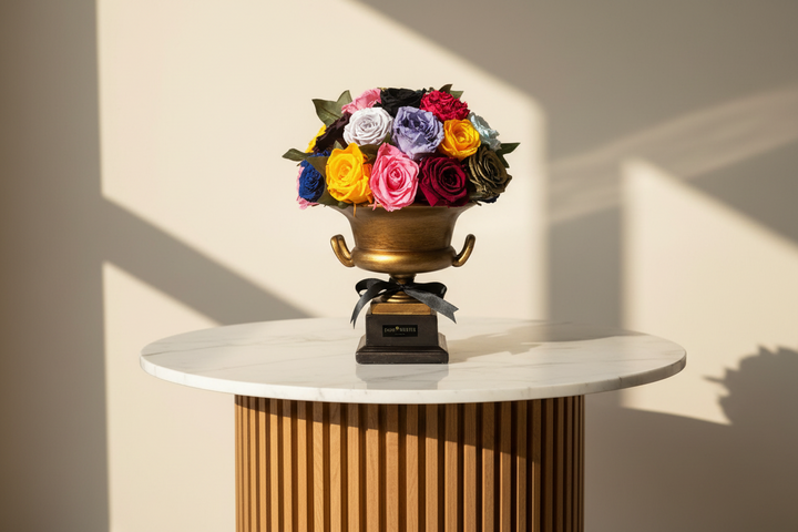 Eternal rose named Loïc by Esor Atelier, beautifully preserved in a clear glass display case.