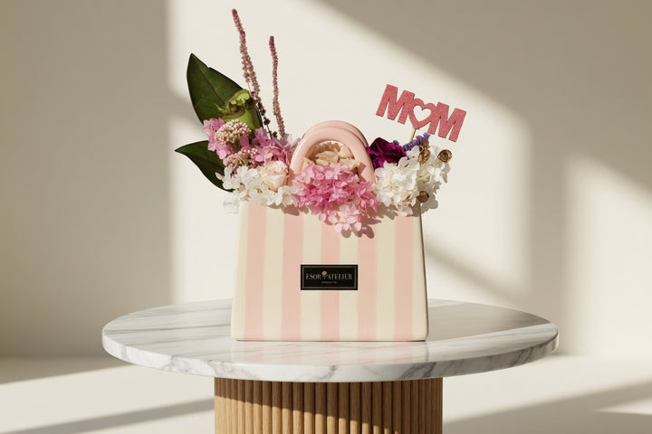 Preserved floral arrangement named Eleanor with lush, delicate flowers from Esor Atelier, arranged in a stylish display.
