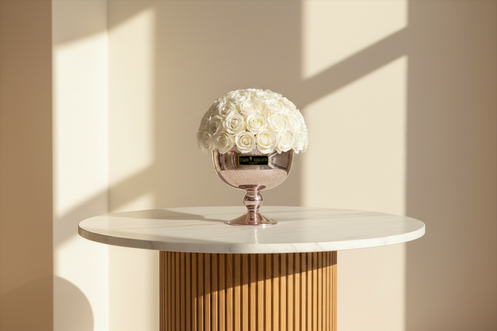 Esor Atelier Chanel Eternal Rose in elegant glass display, showcasing a preserved pink rose with intricate detailing.