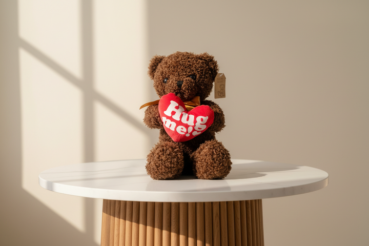 Soft beige Hug Me Teddy Bear by Esor Atelier, showing plush fabric and cuddly appearance on a plain background.