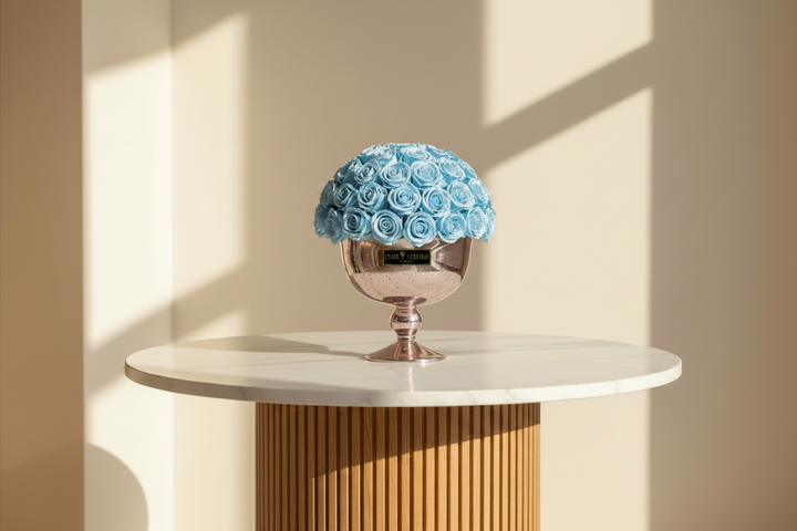 Chanel Eternal Rose by Esor Atelier displayed in a glass dome with intricate details and vibrant red petals.