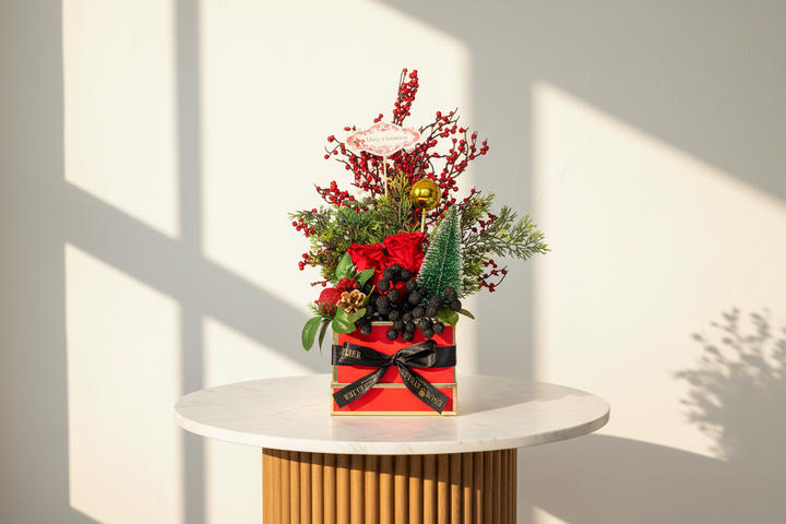 Eternal rose named Arielle by ESOR ATELIER, beautifully preserved in a clear display case with delicate petals and intricate design.