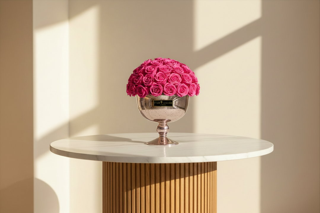 Freshly crafted Chanel Eternal Rose by Esor Atelier displayed in a clear glass dome, showcasing its intricate petals and elegant design.