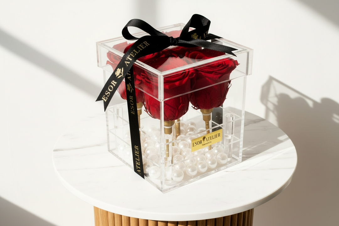 Eternal Aurora Rose by ESOR ATELIER, preserved long-lasting rose with delicate petals displayed in a clear glass vase.