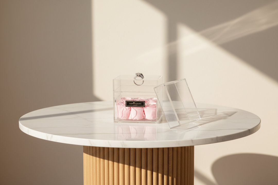 Esmée eternal rose by Esor Atelier with vibrant pink petals and green leaves, showcasing a preserved, everlasting flower.