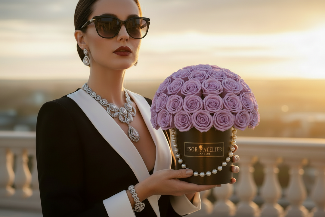 Esor Atelier Eternal Rose in vibrant colors, showcasing delicate petals and a luxurious appearance in a glass display.