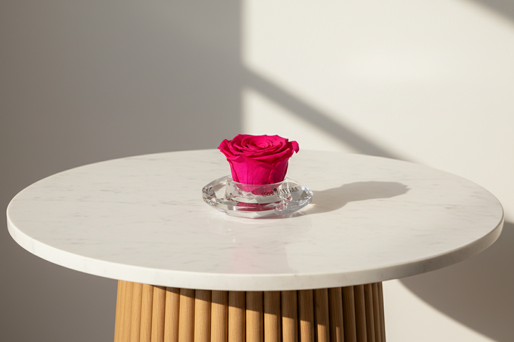 Eternal Heart Rose by Esor Atelier featuring a preserved red rose shaped like a heart in a clear glass display.
