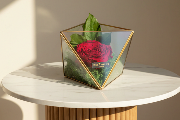 Eternal Desire rose by ESOR ATELIER, preserved red rose in a clear glass dome, showcasing intricate floral details.