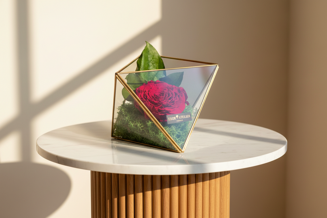 Eternal rose from ESOR ATELIER's Desire collection, showcasing a preserved, vibrant red rose in a sleek display.