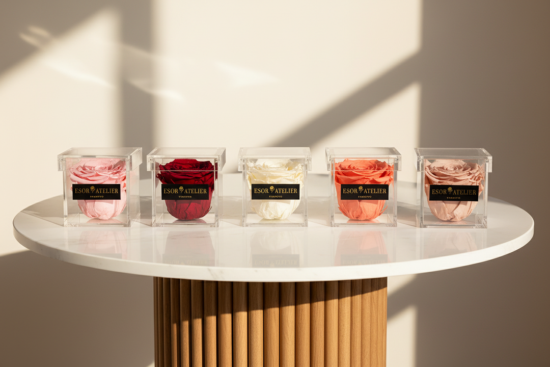 Eternal Rose "Madeline" by Esor Atelier, preserved pink rose in a clear glass display, showcasing delicate petals and elegant design.