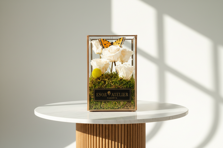 Eternal rose from Le Jardin by ESOR ATELIER, featuring a preserved, vibrant flower in a glass display.