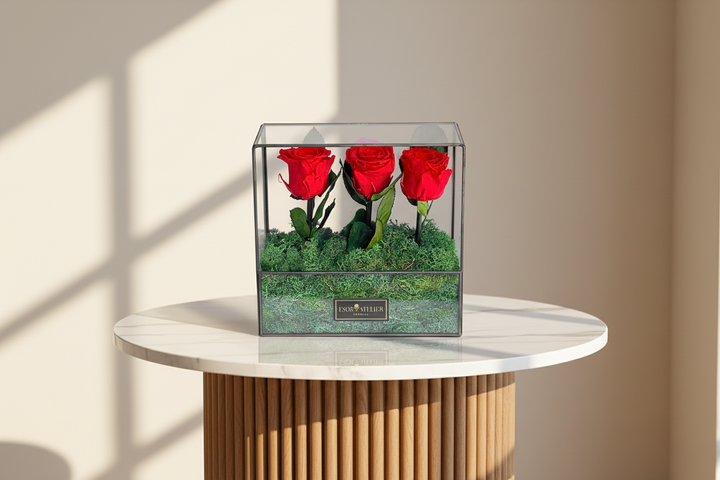 Close-up of the Esor Atelier Clara Eternal Rose, showcasing its delicate, preserved rose petals in a clear glass display.