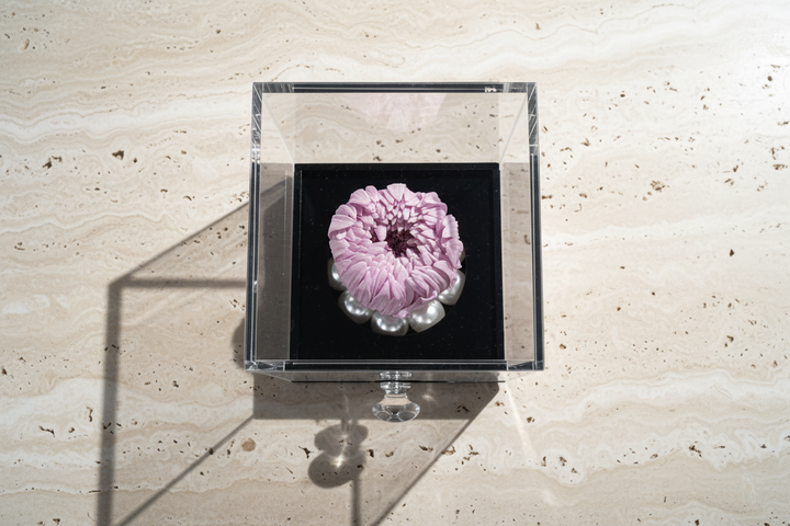 Violette jewelry by Esor Atelier featuring intricate silver design with purple gemstone accents.