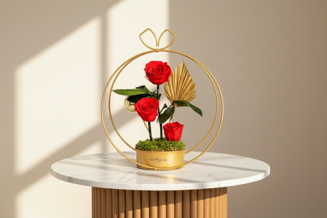 Eternal rose named Aurélie from Esor Atelier with delicate petals and preserved floral beauty in a glass display.
